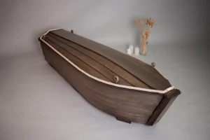 Begravningskista formad som en båt